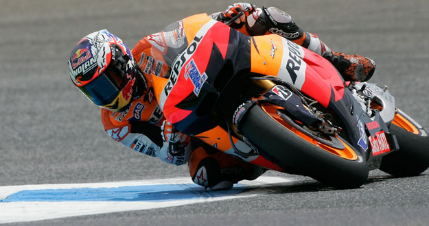 Honda MotoGP rider Casey Stoner of Australia rides his motorcycle during the second free practice session at the Portuguese Grand Prix in Estoril