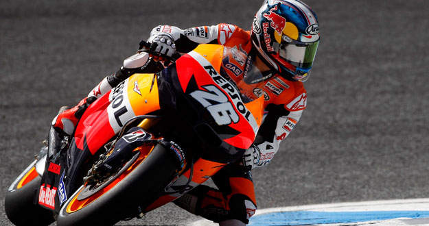 Honda MotoGP rider Pedrosa takes a curve during the first free practice session at the Portuguese Grand Prix in Estoril