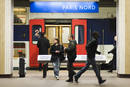 Commuters wait for a train at Gare du Nord train station in Paris