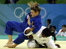 Iglesias of Spain fights with Emane of France during their womens -70kg preliminary judo match at the Beijing 2008 Olympic Games