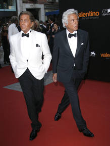 Italian fashion designer Valentino with his companion Giammetti at La Fenice Theatre in Venice