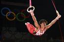 Kohei Uchimura of Japan competes in the rings during the mens individual all-around gymnastics final in London