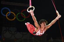 Kohei Uchimura of Japan competes in the rings during the men's individual all-around gymnastics final in London Kohei Uchimura of Japan competes in the rings during the men's individual all-around gymnastics final in London