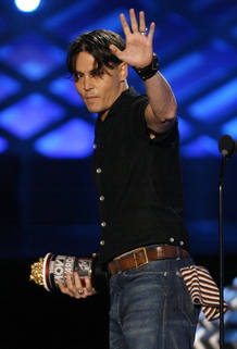 Actor Johnny Depp waves at the 2008 MTV Movie Awards in Los Angeles Actor Johnny Depp waves at the 2008 MTV Movie Awards in Los Angeles