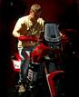Un joven comprueba una de las motos Gas Gas expuestas desde en la Feria MotOh!, certamen de referencia del mundo de la moto en Espa&ntilde;a que se celebra desde hoy en Barcelona.