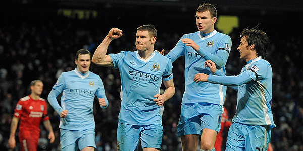 Los jugadores del City celebran el tercer gol de Milner.