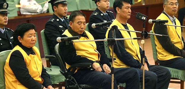 Four former executives of Sanlu Group stand on trial at Shijiazhuang Intermediate People's Court