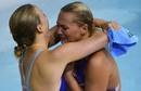 Kelci Bryant and Abigail Johnston of the U.S. hug after winning silver at the womens synchronised 3m springboard final during the London 2012 Olympic Games at the Aquatics Centre