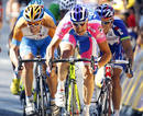 Lampres Petacchi of Italy sprints ahead of Garmin-Transitions Dean of New Zealand and Katushas McEwen of Australia to win fourth stage of Tour de France cycling race between Cambrai and Reims
