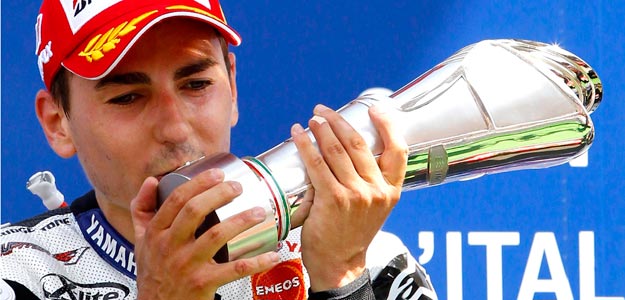 Lorenzo of Spain celebrates on the podium after winning the Italian motorcycling Grand Prix race at Mugello circuit Lorenzo of Spain celebrates on the podium after winning the Italian motorcycling Grand Prix race at Mugello circuit