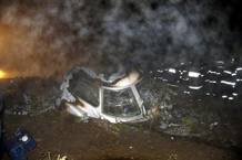 Los equipos de rescate buscan los cuerpos de los fallecidos en el accidente de avi&oacute;n de Yichun