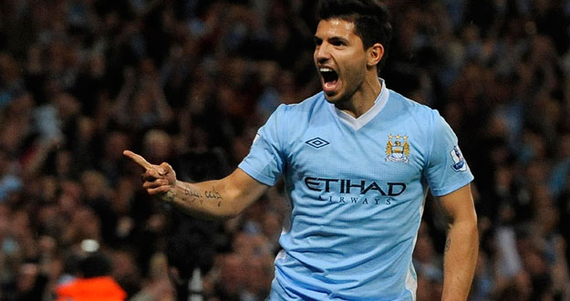 Manchester City's Aguero celebrates after scoring during their English Premier League soccer match against Swansea City in Manchester
