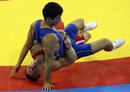 Marcus Thaetner of Germany fights Darkhan Bayakhmetov of Kazakhstan during their 66 kg mens Greco-Roman wrestling 1/8 final match at the Beijing 2008 Olympic Games