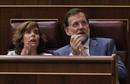 Mariano Rajoy y Soraya S&aacute;ez de Santamar&iacute;a durante la jura de cargo de una nueva diputada del PP
