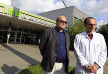 McGuiness manager of U2 lead singer Bono and Professor Joerg Christian Tonn arrive for a Reuters statement in front of a Munich hospital McGuiness manager of U2 lead singer Bono and Professor Joerg Christian Tonn arrive for a Reuters statement in front of a Munich hospital