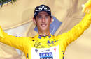 Saxo Banks Schleck of Luxembourg celebrates his leaders yellow jersey on podium after ninth stage of Tour de France cycling race between Morzine-Avoriaz and Saint-Jean-De-Maurienne