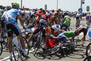 Riders fall during the first stage of the Tour de France cycling race from Rotterdam to Brussels