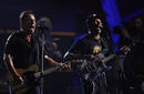 Musician Bruce Springsteen performs with Tom Morello during the first of two 25th Anniversary Rock & Roll Hall of Fame concerts in New York