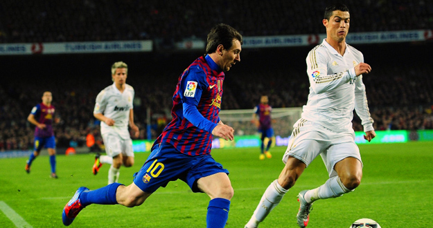 Messi y Cristiano Ronaldo, durante la Supercopa de 2011.