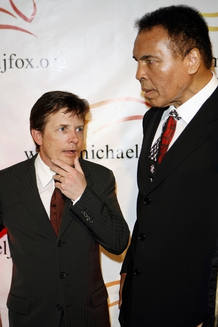 Michael J. Fox speaks to Muhammad Ali as they arrive to attend benefit for Michael J. Fox Foundation for Parkinson's Research in New York City Michael J. Fox speaks to Muhammad Ali as they arrive to attend benefit for Michael J. Fox Foundation for Parkinson's Research in New York City