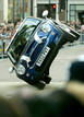 A Mini Cooper arrives at the UK premiere of 