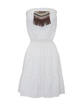 Mini Vestido palabra de honor con abalorios. BlancoSuite (25,99 &euro;)