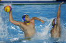Molina of Spain tries to score on Gocic of Serbia during their mens water polo gold medal match at the World Championships in Rome