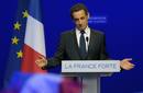 Nicolas Sarkozy, Frances incumbent president, reacts after his defeat for re-election in the second round vote of the 2012 French presidential elections as he appears on stage before UMP party supporters at the Mutualite meeting hall in Paris