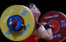 North Koreas Chun Hwa Ryang competes on the women 48Kg Group A weightlifting competition at the London 2012 Olympic Games