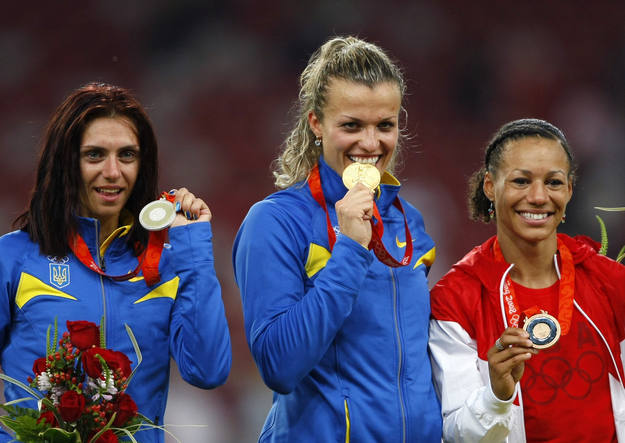 Silver medallist Blonska of Ukraine, gold medallist Dobrynska of Ukraine pose with bronze medallist Fountain of the U.S. after competing in the women's heptathlon in the athletics competition in the National Stadium at the Beijing 2008 Olympic Games Silver medallist Blonska of Ukraine, gold medallist Dobrynska of Ukraine pose with bronze medallist Fountain of the U.S. after competing in the women's heptathlon in the athletics competition in the National Stadium at the Beijing 2008 Olympic Games