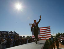 Obama saluda