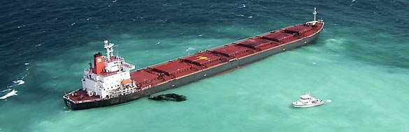 Oil is seen next to the 230m-long bulk coal carrier Shen Neng I about 70 km east of Great Keppel Island