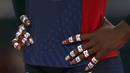 Olympic rings and the Union flag are seen painted on the fingernails of Destinee Hooker of the U.S. during their womens Group B volleyball match at the London 2012 Olympic Games at Earls Court in London