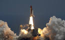 Space shuttle Atlantis lifts off on a mission to NASAs Hubble Telescope from its launch pad at the Kennedy Space Center in Cape Canaveral