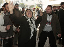 Palestinian woman shouts at hospital in Gaza