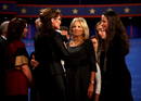 Palin conversa, tras el debate, con varios familiares de Biden