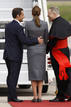 Frances President Nicolas Sarkozy his wife Carla Bruni-Sarkozy and Cardinal Andre Vingt-Trois wait for the arrival of Pope Benedict XVI at Orly Airport, near Paris