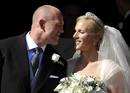 Britains Zara Phillips and her husband Mike Tindall leave after their marriage at Canongate Kirk in Edinburgh