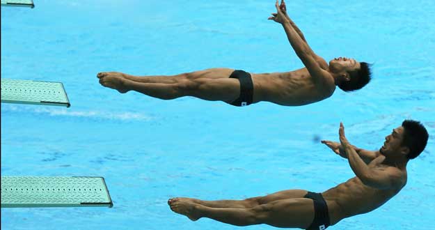 La pareja de salto sincronizado formada por Lin Yue y Huo Liang, oro en los Juegos Olímpicos de Pekín 2008, durante los entrenamientos previos al Mundial de Shanghái La pareja de salto sincronizado formada por Lin Yue y Huo Liang, oro en los Juegos Olímpicos de Pekín 2008, durante los entrenamientos previos al Mundial de Shanghái