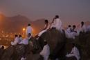 Muslim pilgrims pray on Mount Mercy on the plains of Arafat during the annual haj pilgrimage, outside the holy city of Mecca