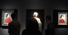 Journalists look at paintings by Botticelli at Bode museum in Berlin