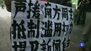 Ir al Video&nbsp;Los periodistas chinos que protestaban por la censura llegan a un acuerdo con las autoridades