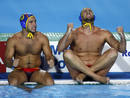 Perrone and Molina of Spain watch the penalty shoot out during their mens water polo gold medal match against Serbia at the World Championships in Rome