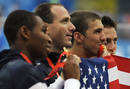 Phelps, Weber-Gale, Jones and Lezak of the U.S. celebrate with their gold medals after winning the mens 4x100m freestyle relay swimming final at the Beijing 2008 Olympic Games