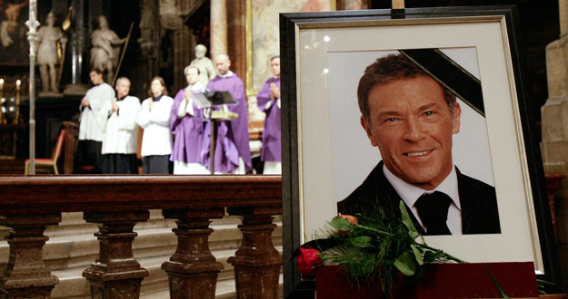 A photo of Austrian far right leader Haider stands in St. Stephens Cathedral in Vienna