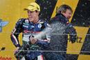 Pol Espargar&oacute; celebra con cava su victoria en Moto2