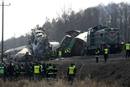 Polish emergency services work at the site of a train crash near the town of Szczekociny