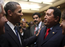 U.S. President Barack Obama greets his Venezuela counterpart Hugo Chavez before the opening ceremony of the 5th Summit of the Americas