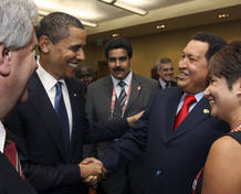 U.S. President Barack Obama greets his Venezuela counterpart Hugo Chavez before the opening ceremony of the 5th Summit of the Americas