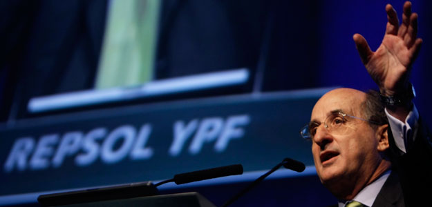 Repsol YPF's chairman Brufau gestures during a speech in Madrid